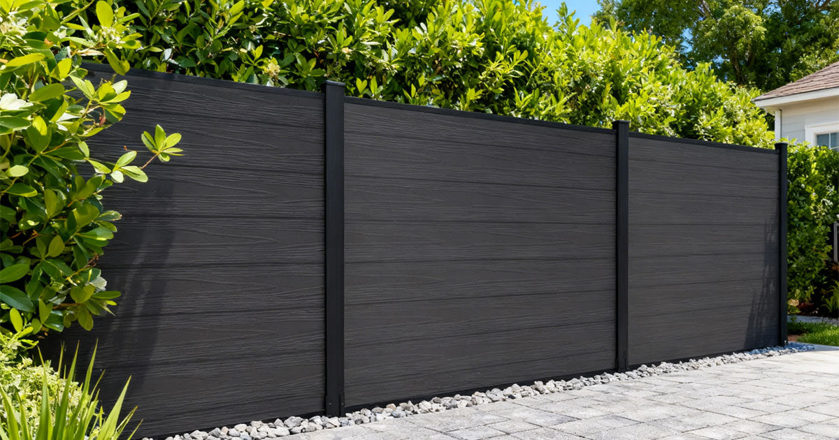 Modern composite fence installed in backyard – WPC privacy fence 2025