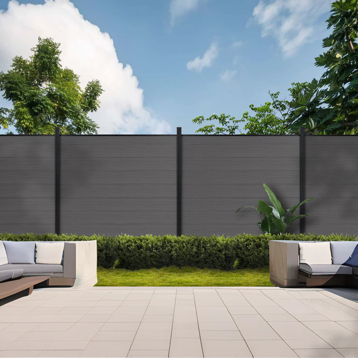 Brushed finish WPC fence screen installed in garden with black metal post