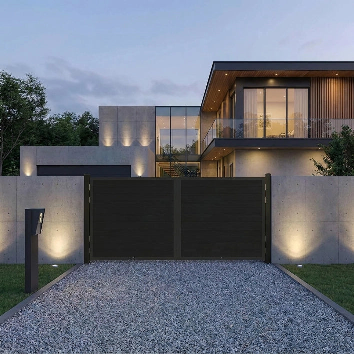 Heavy duty aluminum double driveway gate 12ft with automatic linear arm opener at night.